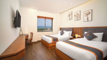 Deluxe Twin Room, Sea View | In-room safe, desk, blackout drapes, soundproofing