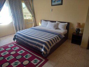Comfort Room, Balcony, City View | Desk, laptop workspace, soundproofing, free WiFi - Mucenty Hotels  (Omu-Aran)