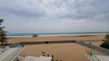Economy Room, Balcony, Beach View | Beach/ocean view