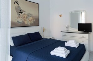 4 bedrooms, iron/ironing board, travel cot, WiFi