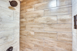 A shower area with beige and light brown tiles. - HBG Apt ~ 3 Mi to Downtown & River! (Harrisburg)