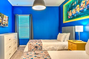 A room with a bed, bedside table, dresser, and a window with blinds. - Amazing 5BD Family Townhouse at Paradiso Grande (Orlando)
