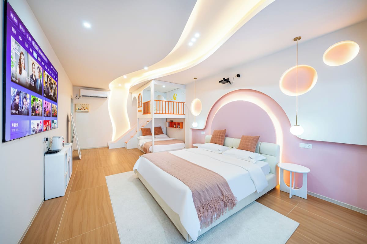 Family Quadruple Room | Down comforters, individually decorated, individually furnished, desk