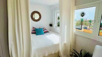 1 bedroom, desk, iron/ironing board, travel cot