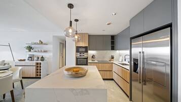 Apartment, 2 Bedrooms | Private kitchen | Fridge, oven, stovetop, coffee/tea maker