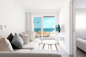 Standard Apartment, Sea View | Living area | 42-inch TV with digital channels, table tennis, books - Sunwing Arguineguín Seafront (Mogan)