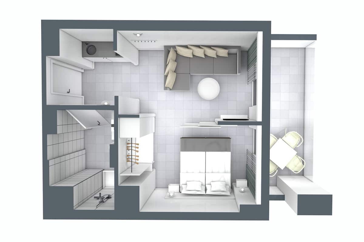 Une salle de bain moderne équipée d’une douche, de toilettes et d’un lavabo.