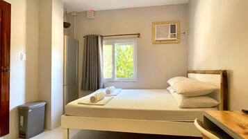 Standard Quadruple Room | Blackout drapes, WiFi (free), bed sheets