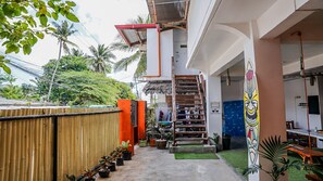 Experience a cozy home away from home with a central staircase connecting the living spaces.