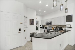 Fridge, microwave, oven, stovetop - Pet Friendly Pool Home Very Close to Disney! (Kissimmee)