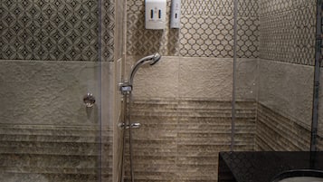 Shower, hair dryer, slippers, towels