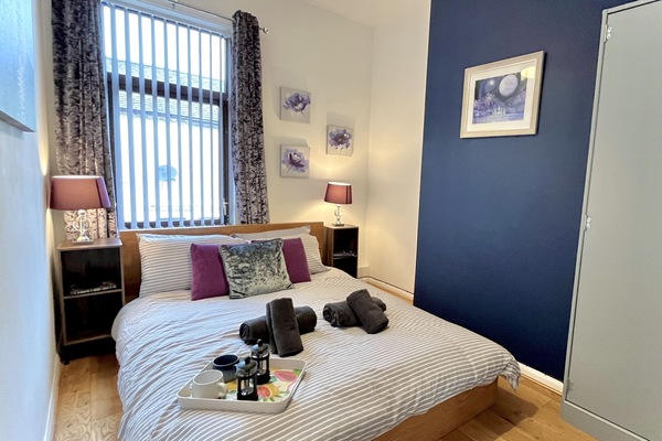 Bedroom 2 - Unwind in style and serene sleeping space