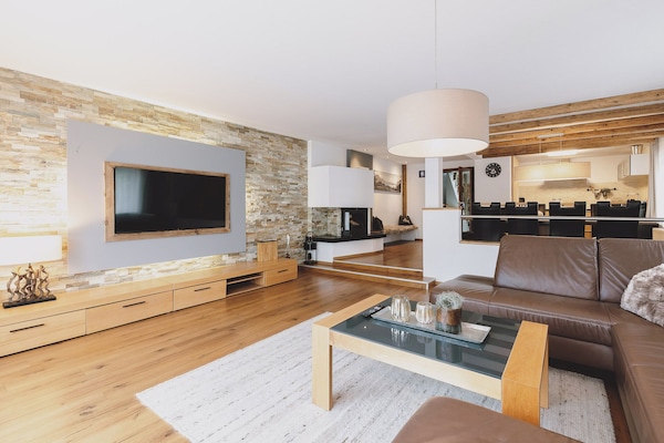 Deluxe Chalet, Mountain View | Living area | Flat-screen TV, fireplace, video-game console