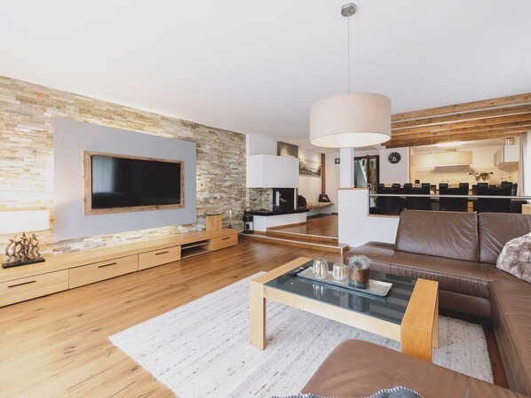 Deluxe Chalet, Mountain View | Living area | Flat-screen TV, video-game console - Chalet Naila by we rent (Bruck an der Grossglocknerstrasse)