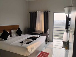 Quarto casal superior | Vista para o jardim