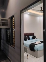 Habitación Deluxe doble, vistas a la ciudad | Sábanas de algodón egipcio y ropa de cama de alta calidad