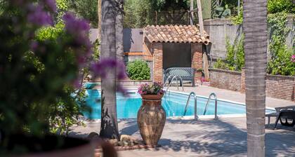Elegant villa in the green of a forest on main road ta Taormina and Catania