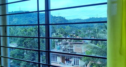 A perfect place to relax in this calm and serene 1 BHK hill view homestay.