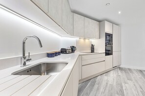 Apartment, Multiple Beds, Patio, City View (Bejoux Court - Apt 2) | Private kitchen - Bejoux Court - Apt 2 (Harrow)