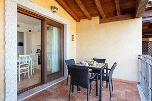 Outdoor dining - Myrsine 13 4 - home with shared pool and seaview (Olbia)