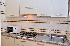 Fridge, microwave, stovetop, highchair