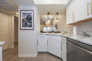 Fridge, microwave, oven, stovetop - Chic Desert Retreat: Walk to Trails, Hot Tub, Pool (Tucson)