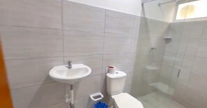 Shower, towels, soap, toilet paper
