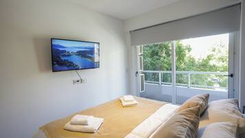 2 habitaciones, tabla de planchar con plancha, wifi y ropa de cama