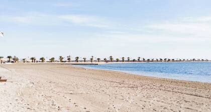 Family-Friendly Apartment with Patio – Steps from Playa Villanitos