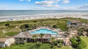A resort with a swimming pool, beach access, and a view of the ocean. - Family-Friendly 2BR Condo Near Beach & Barefoot Landing (Myrtle Beach)