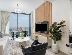 TV - Discover Sobha Hartland's Downtown Oasis with Pool (Dubai)