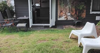 Chalet, with fenced garden of 200m2. Your dog is also welcome