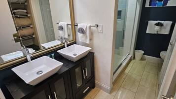 Hair dryer, towels, soap, shampoo