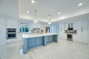 Fridge, microwave, oven, stovetop - Pool & Spa: Luxe Home in Naples! (Naples)