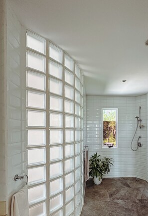 Shower, towels, soap, toilet paper