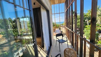 Suite, 1 cama King size, en esquina | Terraza o patio