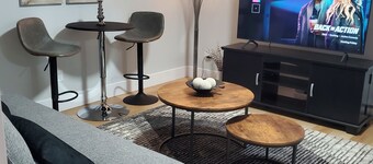 A comfortable private 1 bedroom basement apartment for a relaxing stay.