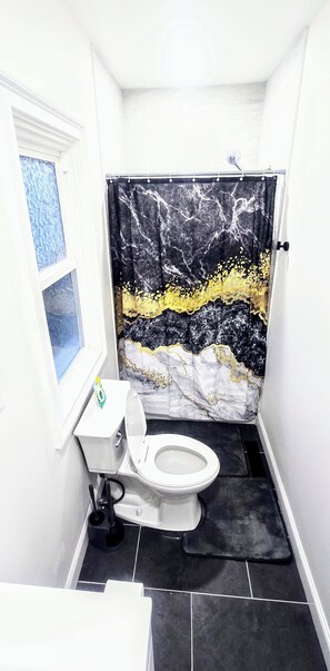 Hair dryer, towels, soap, toilet paper