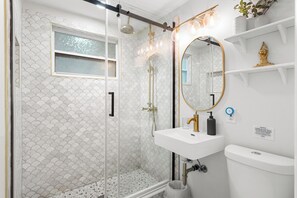 Shower, hair dryer, towels, soap