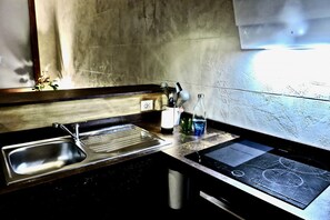 Fridge, microwave, stovetop, coffee/tea maker