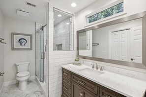 Shower, hair dryer, towels