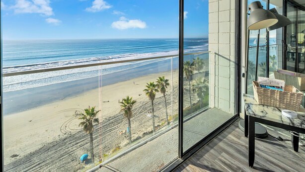 A balcony with a view of the beach and ocean. - Oceanfront Oasis with Stunning Panoramic Views in Pacific Beach! - Sea It All (San Diego)
