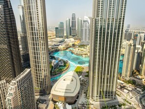 A high-rise building with a central courtyard and surrounding high-rise buildings.