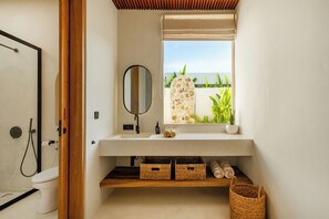 Deluxe Villa, 3 Bedrooms, Patio, Pool View | Bathroom | Towels, soap, shampoo, toilet paper - Villa Rheia Pererenan (Canggu)