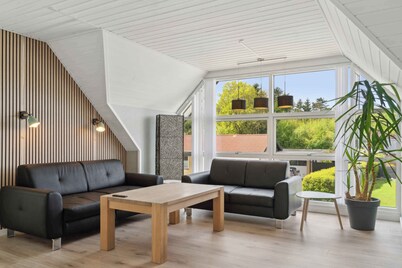 Near beach and golf, with multi-purpose room.