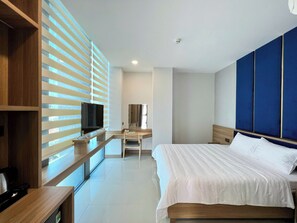 Habitación individual Grand | Escritorio, wifi gratis y ropa de cama 