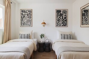 4 bedrooms, desk, iron/ironing board, travel cot