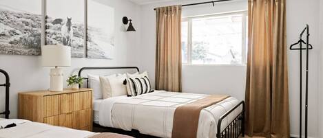 4 bedrooms, desk, iron/ironing board, travel cot