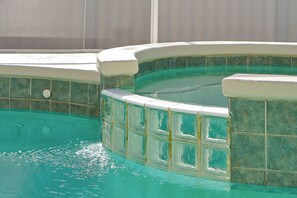 A swimming pool with a tiled edge and a white border. - Highlands Reserve, close to Disney World (Davenport)