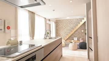 Fridge, microwave, cookware/dishes/utensils